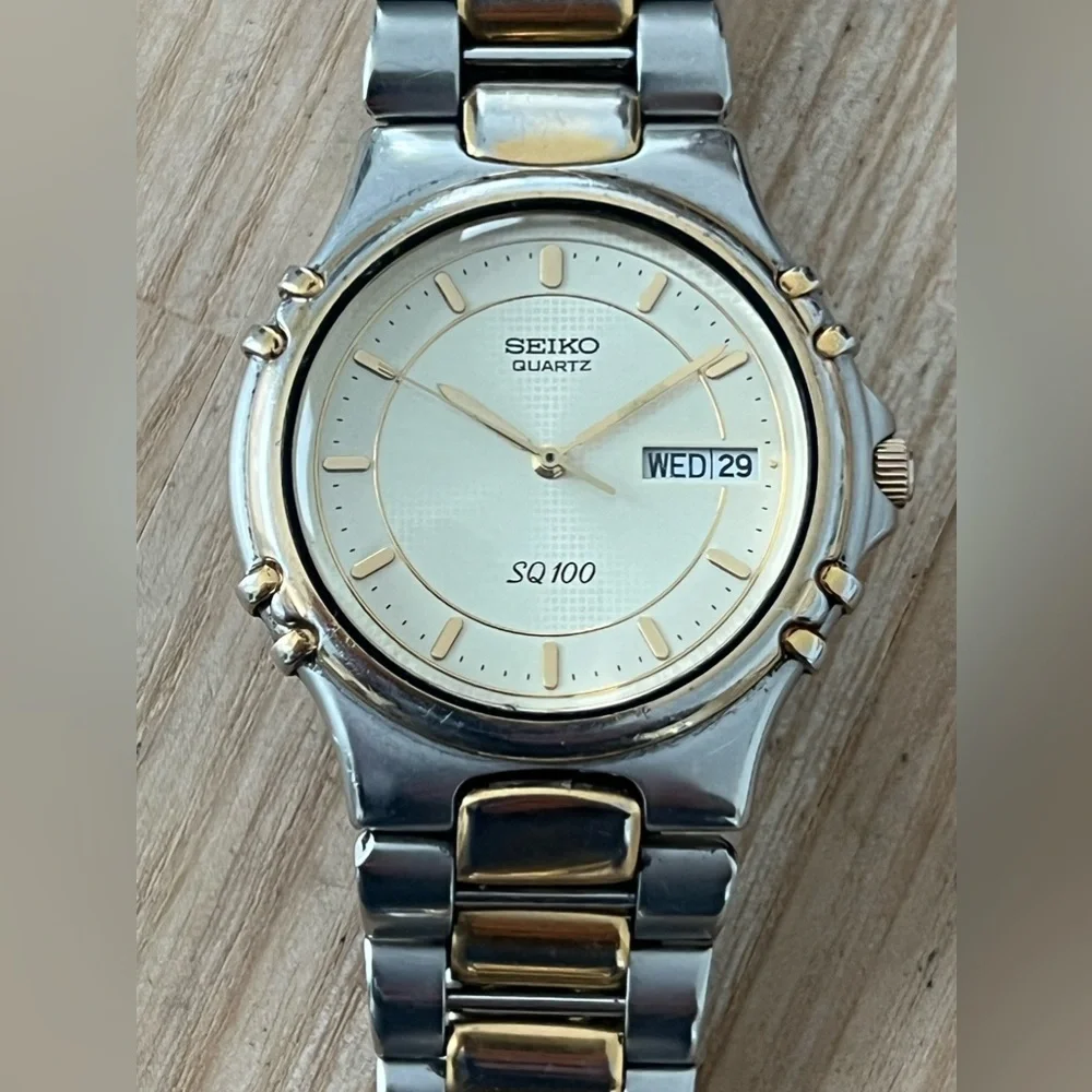 Seiko SQ 100 Rare Vintage Men’s Watch Light Gold-Tone Dial Two-Tone Bracelet